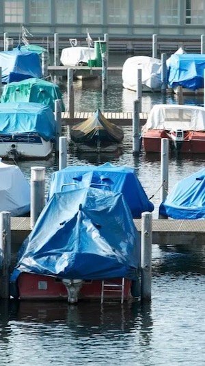 covered boats in the water