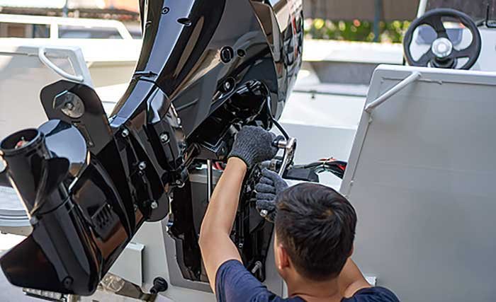 servicing outboard boat engine